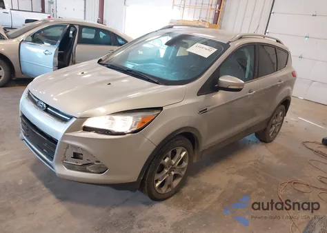 2014 Ford Escape Titanium z USA, uszkodzony, nr VIN 1FMCU0JX5EUA83417